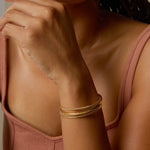 Bryan Anthonys Layers of You Collection Bracelet Stack Entwined Aligned Simplicity Bangles in Gold On Model