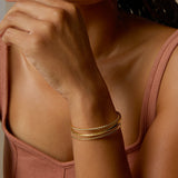 Bryan Anthonys Layers of You Collection Bracelet Stack Entwined Aligned Simplicity Bangles in Gold On Model