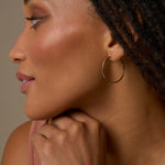 Bryan Anthonys Layers of You Simplicity Dainty Hoops in Gold on Model