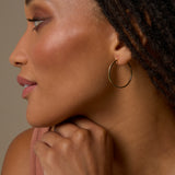 Bryan Anthonys Layers of You Simplicity Dainty Hoops in Gold on Model