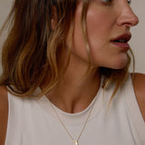 Model wearing In The Heart Of Necklace in gold