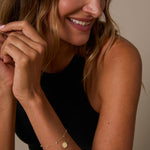 Bryan Anthonys Squad Dainty Bracelet on Model in Gold