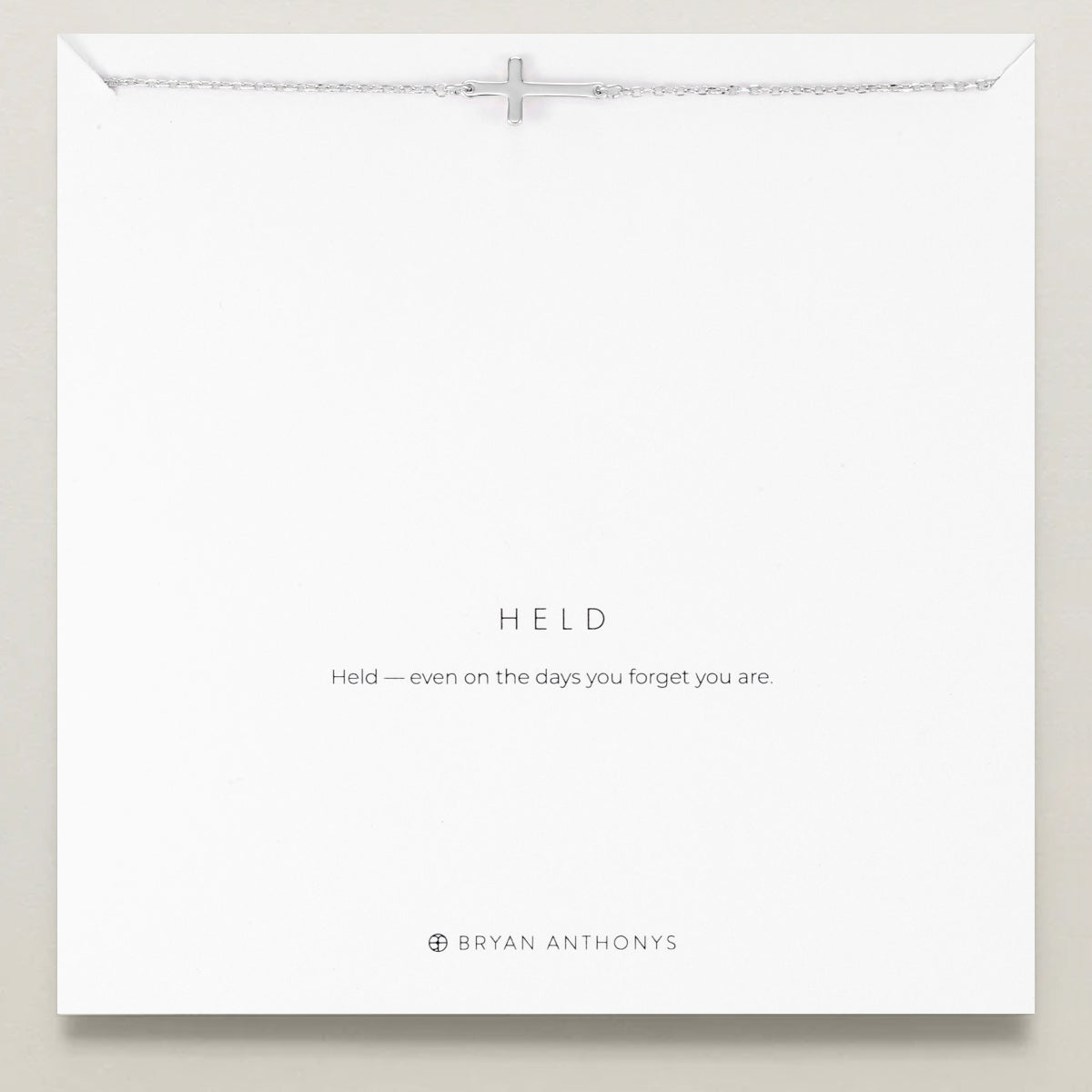 Held Cross Necklace