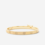 Bryan Anthonys Sea Seeker Gold Hinged Bracelet with sea shell engravings macro