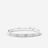 Bryan Anthonys Sea Seeker Silver Hinged Bracelet with sea shell engravings macro