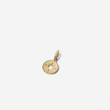 Stories of You — Never Lost Charm showcase in 14k gold finish