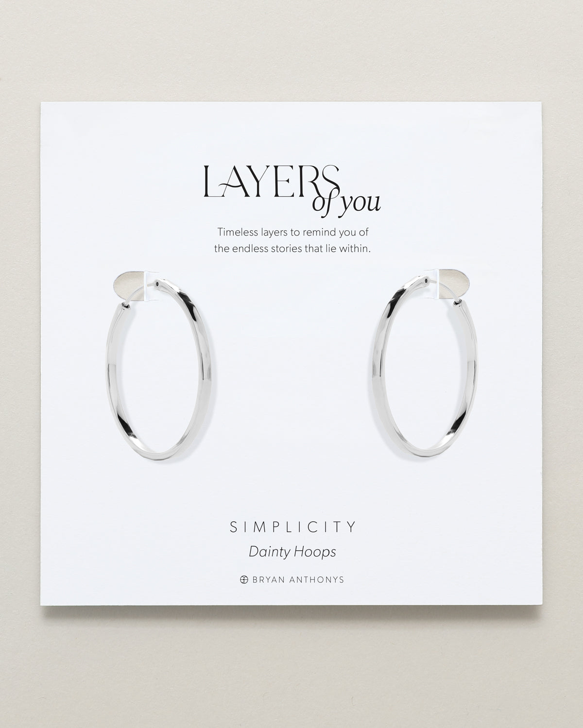 Bryan Anthonys Layers of You Simplicity Silver Hoop Earrings On Card