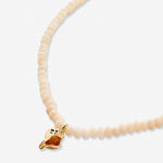 Bryan Anthonys Gold Listen Beaded Necklace Macro