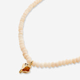 Bryan Anthonys Gold Listen Beaded Necklace Macro