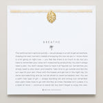Bryan Anthonys Gold Beaded Breathe Necklace On Card