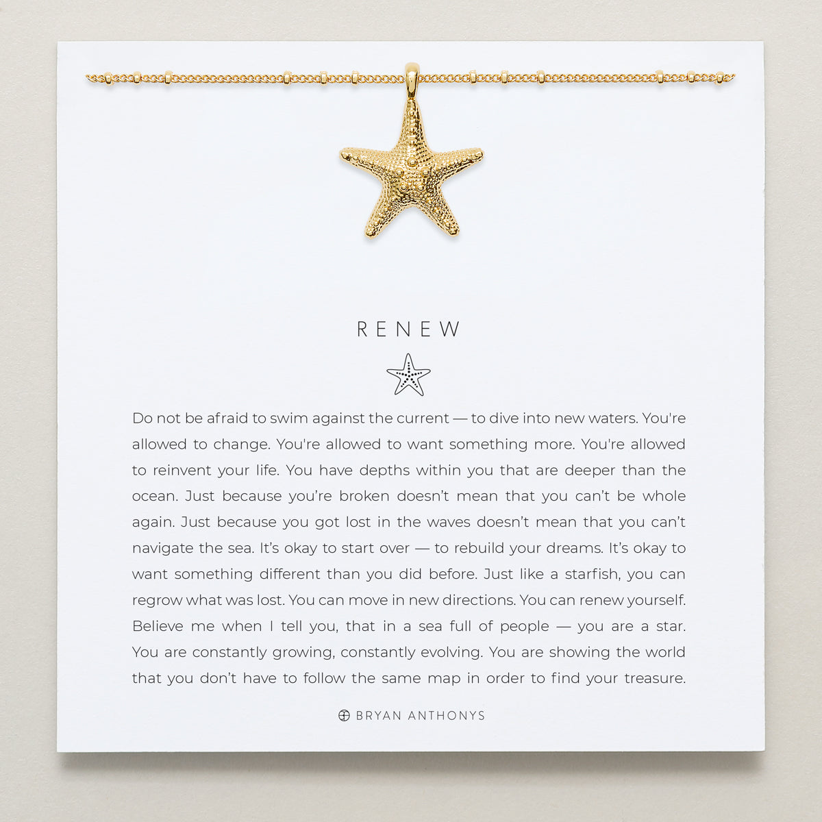 Bryan Anthonys Gold Renew Pendant Necklace On Card