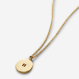 Close-up of Pause Necklace in 14k gold finish