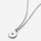 Close-up of Pause Necklace in silver finish