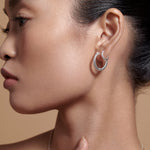 Bryan Anthonys Begin Again Midi Hoop Earrings on Model in Silver