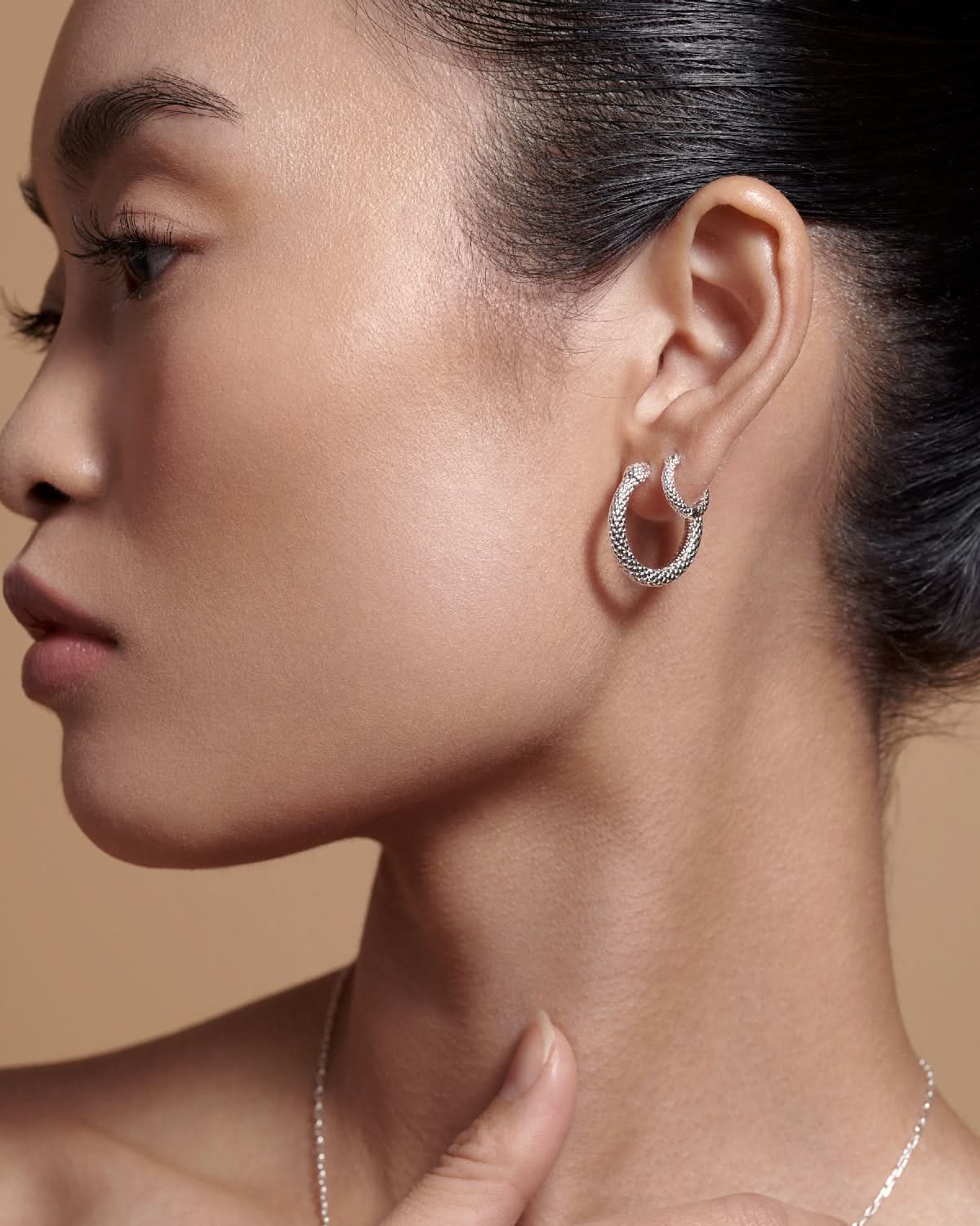 Bryan Anthonys Begin Again Mini Hoop Earrings on Model in SilverBryan Anthonys Begin Again Mini Hoop Earrings On Model