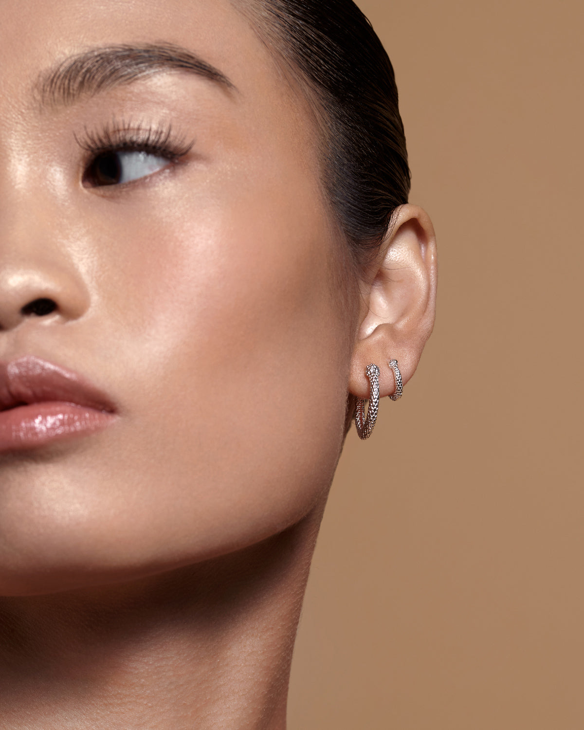 Bryan Anthonys Begin Again Midi Hoop Earrings on Model in Silver