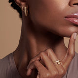 Bryan Anthonys Begin Again Mini Hoop Earrings on Model in Gold