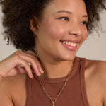 Bryan Anthonys Grit Gold Charm Necklace On Model