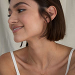 Bryan Anthonys Us Against The World Gold Necklace On Model