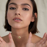 Bryan Anthonys Us Against The World Gold Necklace On Model