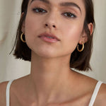 BRYAN ANTHONYS ENTWINED TWISTED HOOP EARRINGS ON MODEL