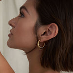 BRYAN ANTHONYS ENTWINED TWISTED HOOP EARRINGS ON MODEL