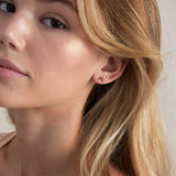Model wearing Highs and Lows Stud Earrings