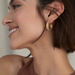 Bryan Anthonys Aligned Beaded Hoop Earrings On Model