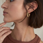 Bryan Anthonys Aligned Beaded Hoop Earrings On Model