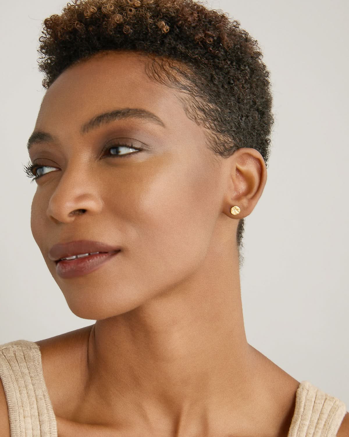 Model wearing Stars Can't Shine Without Darkness Earrings