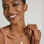 Model wearing Create Your Own Constellation Necklace in 14k gold finish