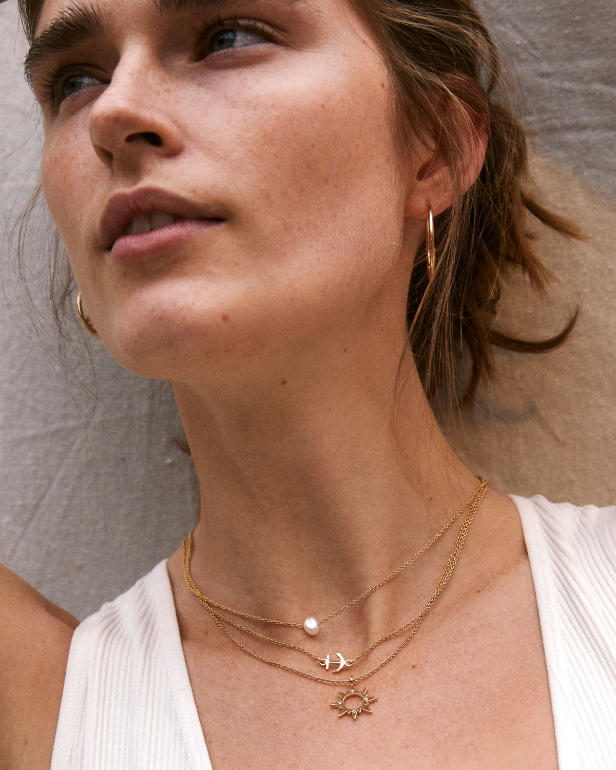 Bryan Anthonys Sun Will Rise Gold Necklace with crystals on model