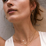 Bryan Anthonys Sun Will Rise Gold Necklace with crystals on model