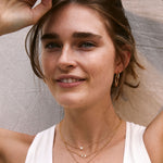 Bryan Anthonys Sun Will Rise Gold Necklace with crystals on model