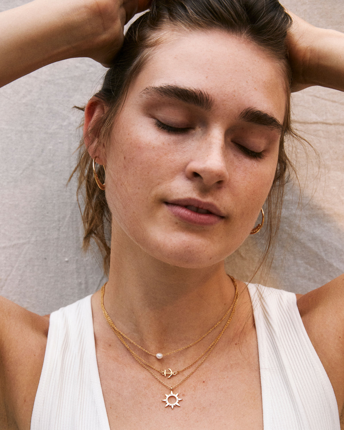 Bryan Anthonys Sun Will Rise Gold Necklace with crystals on model