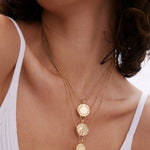 Model wearing Depth Necklace in 14k gold finish