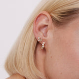 Bryan Anthonys Beautifully Broken Gold Huggie Earrings On Model