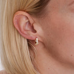 Bryan Anthonys Beautifully Broken Gold Huggie Earrings On Model