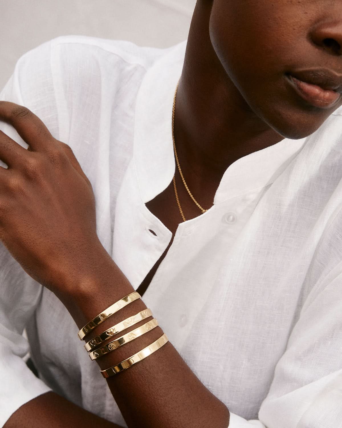 Bryan Anthonys Squad Gold Engraved Cuff On Model