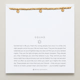 Close-up of Squad Beaded Icon Bracelet in 14k gold finish