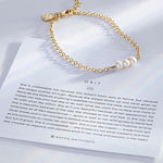 Grit Dainty Chain Bracelet showcase in 14k gold on card