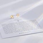Breathe Earrings on card in 14k gold finish