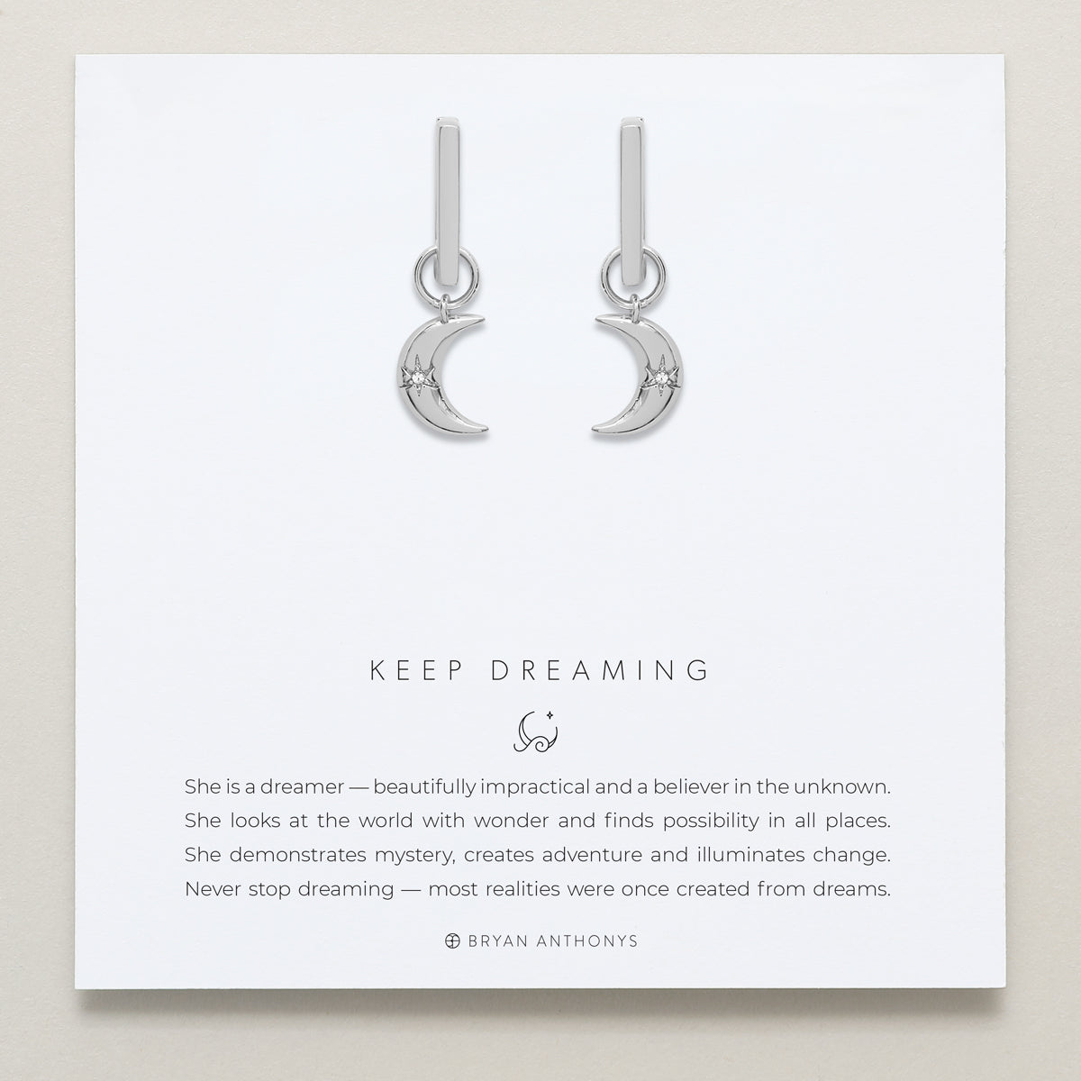 Close-up of Keep Dreaming Huggies in silver finish