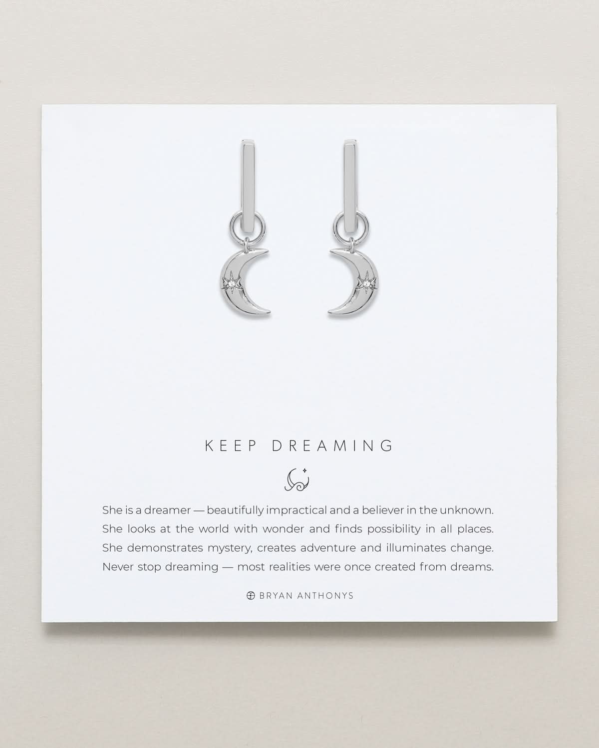 Close-up of Keep Dreaming Huggies in silver finish