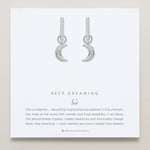 Close-up of Keep Dreaming Huggies in silver finish