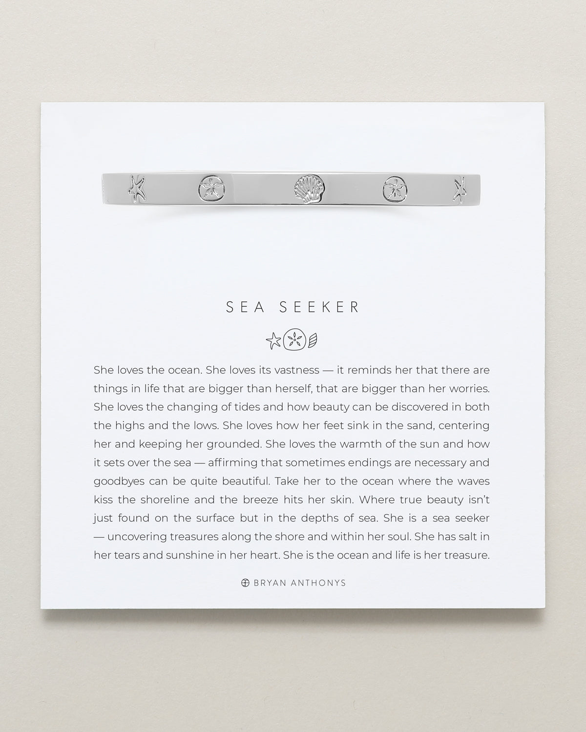 Bryan Anthonys Sea Seeker Silver Hinged Bracelet with sea shell engravings on card
