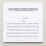 Bryan Anthonys Sea Seeker Silver Hinged Bracelet with sea shell engravings on card