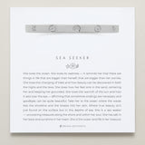 Bryan Anthonys Sea Seeker Silver Hinged Bracelet with sea shell engravings on card