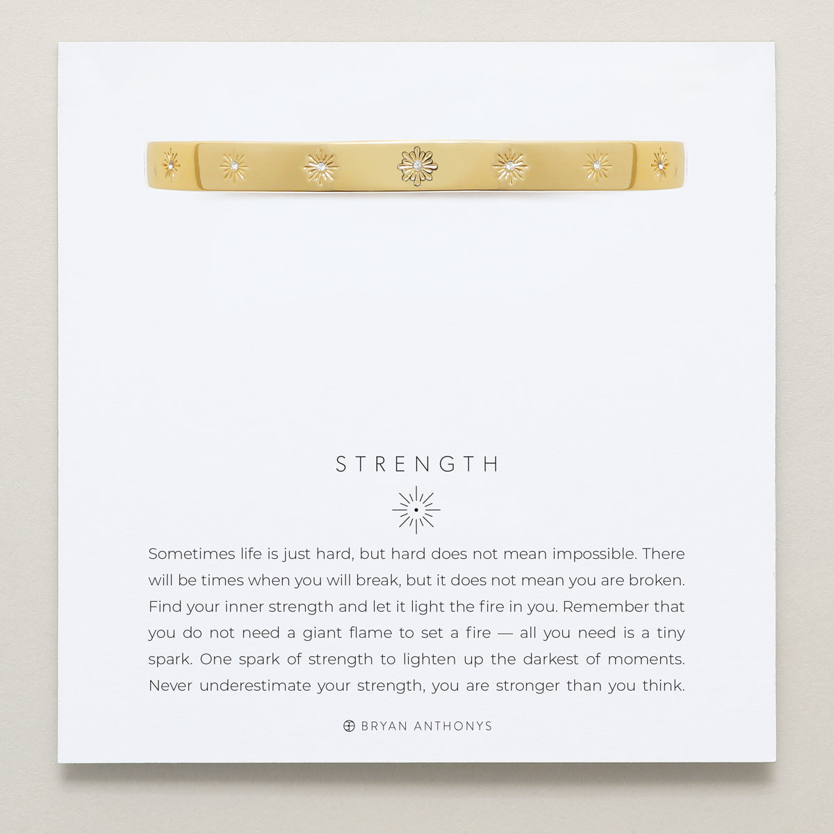 Bryan Anthonys Strength Gold Hinged Bracelet with Crystals on card