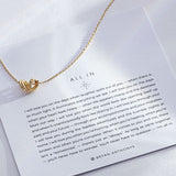 All In Necklace on card in 14k gold finish